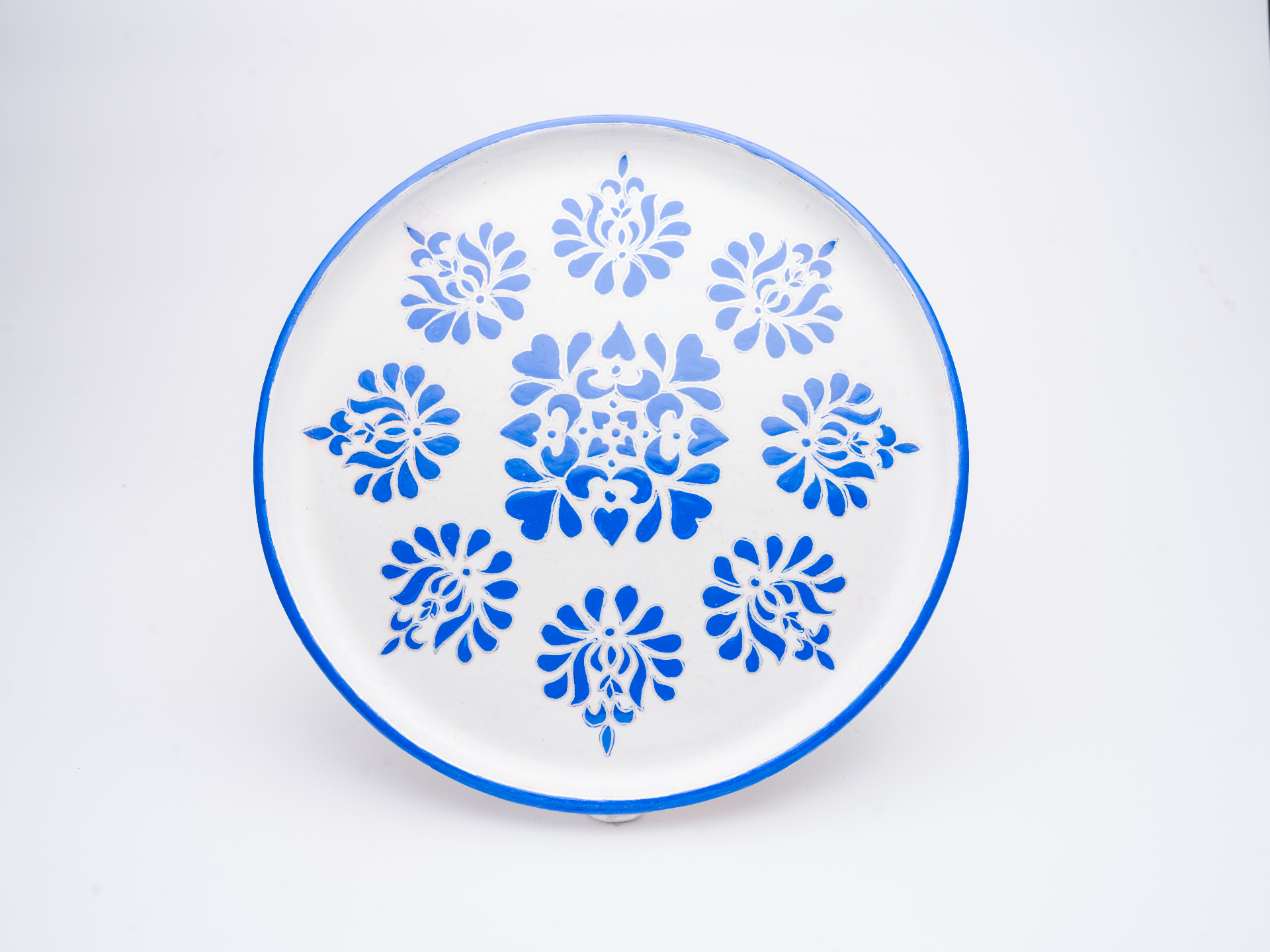 Cobalt Bloom I — white plate with blue floral patterns