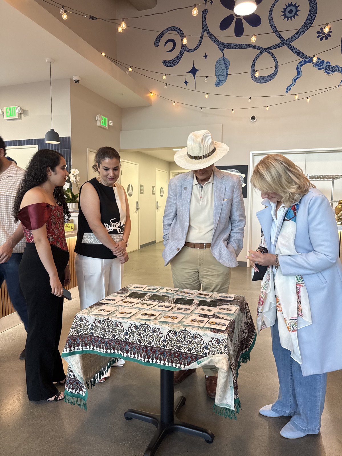 Guests browsing handmade jewellery at the Los Angeles event